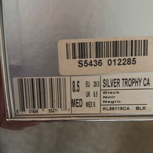 Kenneth Cole New York Silver Trophy Heels